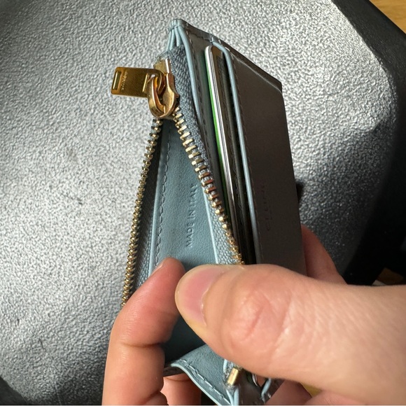 COMPACT WALLET WITH COIN TRIOMPHE IN SHINY CALFSKIN
PALE BLUE. - Picture 3 of 11